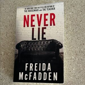 Never Lie by Freida McFadden - Black, White & Red Paperback